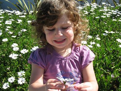 zoe-with-flowers.JPG