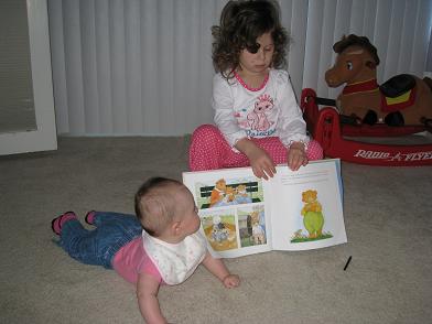 Zoe reading to Avery