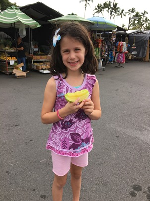 Avery eating dragonfruit