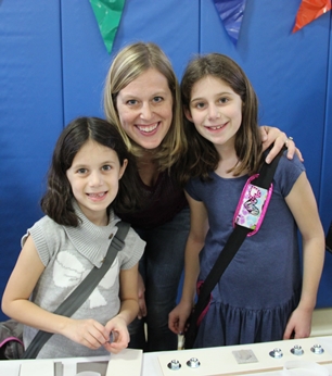 girls and Mommy at Hanukkah party