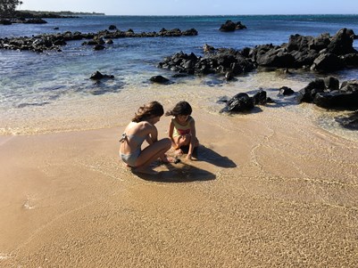 girls playing in sand