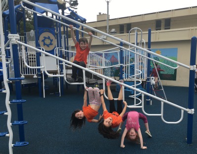 Avery and friends on the playground