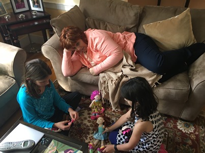 girls playing with Aunt Sandy