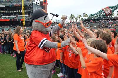 Brandeis chorus with Lou Seal - small