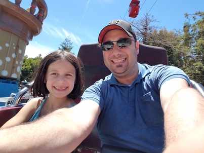 Avery and Daddy on ride