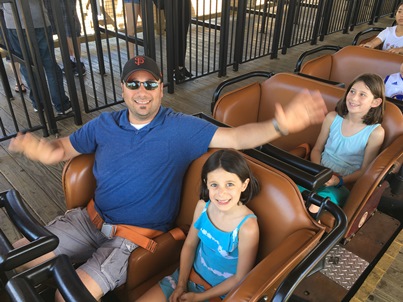 Zoe, Daddy and Avery on ride