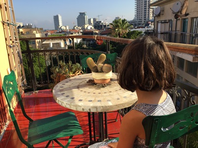 Avery on balcony