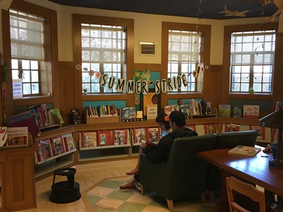 Avery and Daddy at library