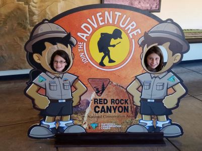 girls-with-red-rock-canyon-sign