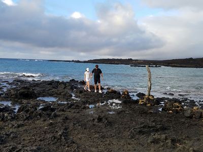 zoe-and-daddy-walking-on-rocks