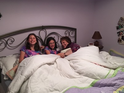 girls-and-sandy-in-bed